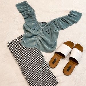 Zara crop top with adorable ruffles with a cinch up the middle.